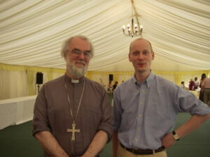 Photo of Adrian Vincent with Archbishop Rowan Williams in 2006,